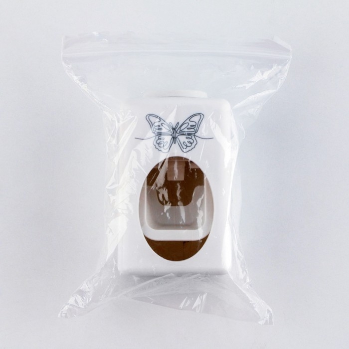 Дозатор для зубной пасты механический «Бабочка», 9.5 х 5.8 см. Дозатор для зубной пасты механический «Бабочка», 9.5 х 5.8 см.