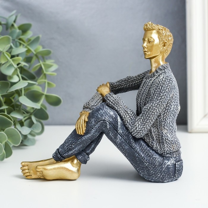 Сувенир полистоун  Сувенир полистоун "Молодой человек в сером свитере, сидит" 14,5х7х14 см