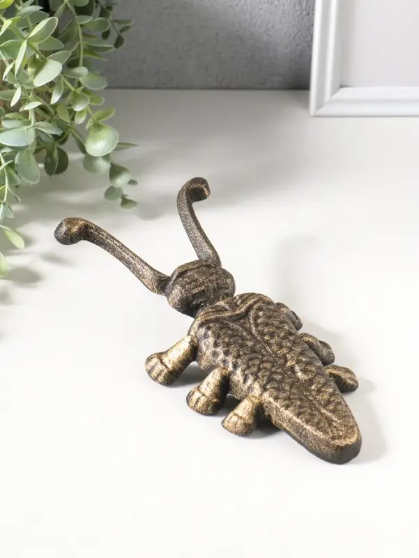 Сувенир чугун съемник для снятия обуви "Жук-скарабей" 22х10х5,8 см