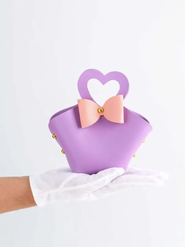 Кожаная подарочная сумочка для бижутерии и сувениров, сиреневая с бантом, 10.5&times;5&times;6 см