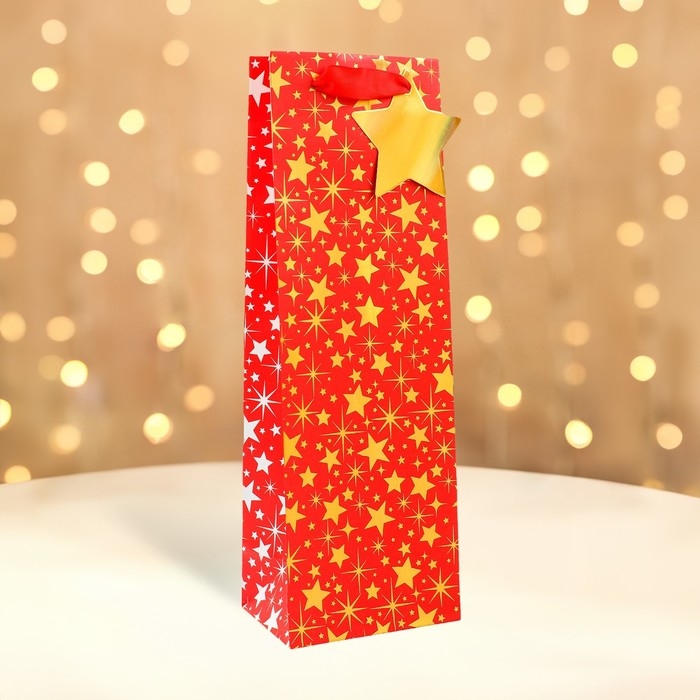 Новый год. Пакет подарочный новогодний под бутылку, упаковка  Новый год. Пакет подарочный новогодний под бутылку, упаковка "Звездочки", 12 х 36 х 8,5 см.