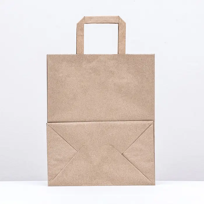 Пакет бумажный крафт, плоская ручка 24×14×29 см, 90 г/м² Пакет бумажный крафт, плоская ручка 24×14×29 см, 90 г/м²