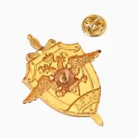 Значок "МВД России", красный в золоте Значок "МВД России", красный в золоте