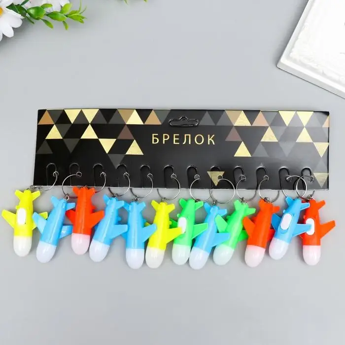 Фонарик свет на кольце  Фонарик свет на кольце "Самолет" мигает МИКС 6,3х4х2 см