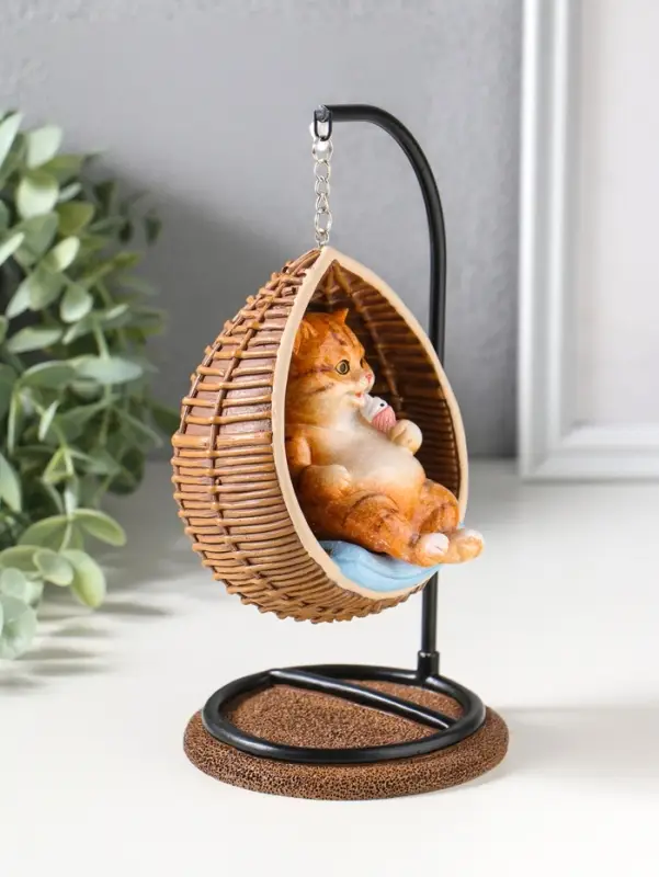 Сувенир полистоун лак "Пухлый кот ест мороженое, в кресле-качеле" 11,5х10,5х18 см