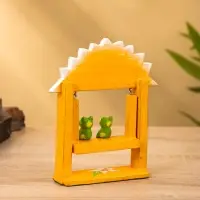 Сувенир "Лягушата на качелях" дерево 10х3,5х15 см, цв.  оранжевый Сувенир "Лягушата на качелях" дерево 10х3,5х15 см, цв.  оранжевый