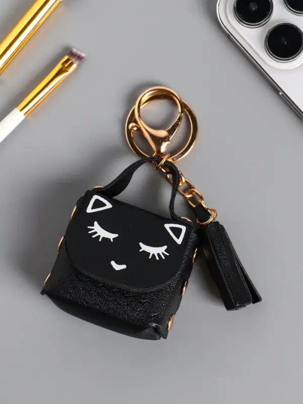 Брелок кожзам с карабином, с кистью Брелок кожзам с карабином, с кистью "Сумочка. Котик" чёрный 5х2,5х6 см