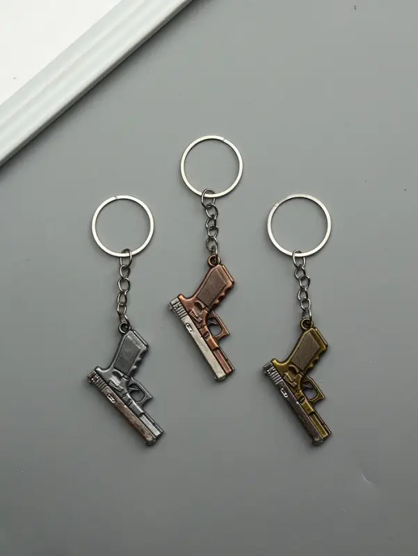 Брелок металл "Пистолет" двигается затвор МИКС 3х4,3х0,5 см