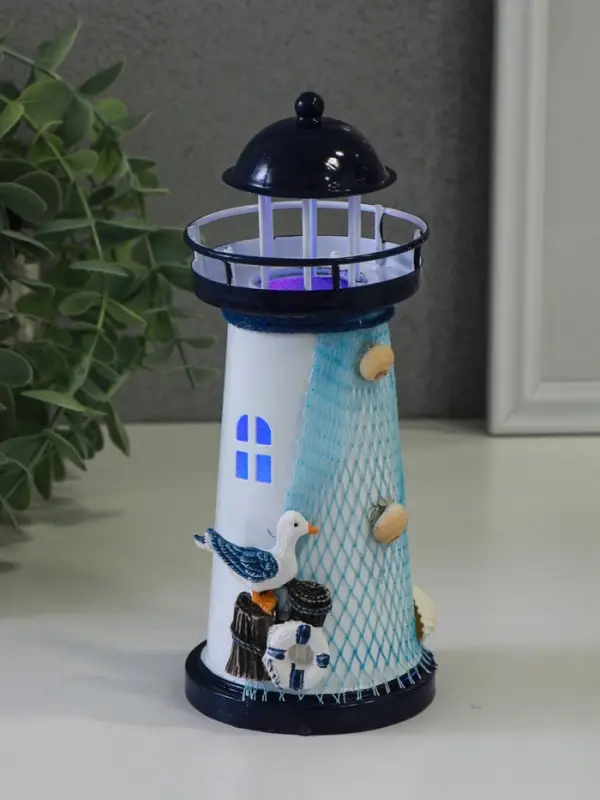 Сувенир настольный Сувенир настольный "Маяк с птицей" сетка, синий, 3хLR1130, RGB, LED 7,5х7,5х18 см