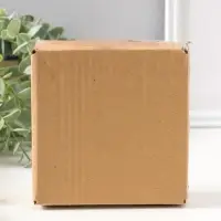 Сувенир полистоун "Девочка в комбинезоне с заячьими ушами, везет тележку с зайцами" 13,5 см   109278