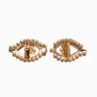 Зажим для кардигана "Ажур", глазки, цвет белый в золоте Зажим для кардигана "Ажур", глазки, цвет белый в золоте