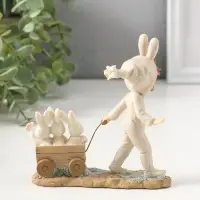 Сувенир полистоун "Девочка в комбинезоне с заячьими ушами, везет тележку с зайцами" 13,5 см   109278