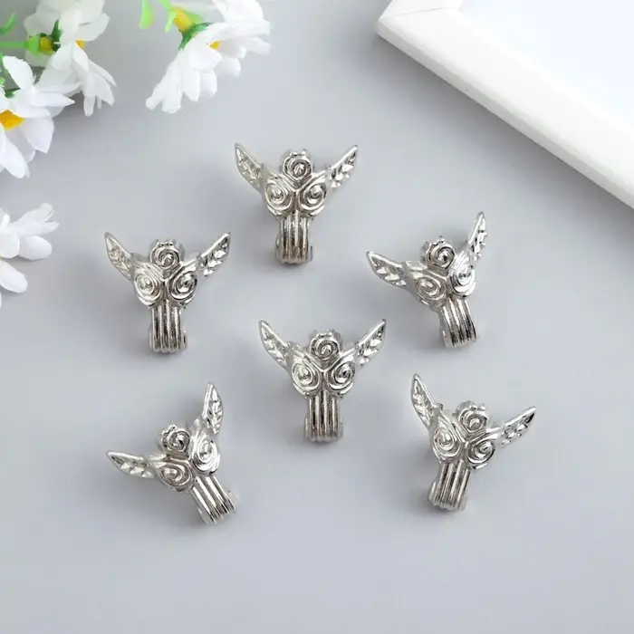 Уголок (ножка) для шкатулки металл Уголок (ножка) для шкатулки металл "Розы" серебро 3х3 см