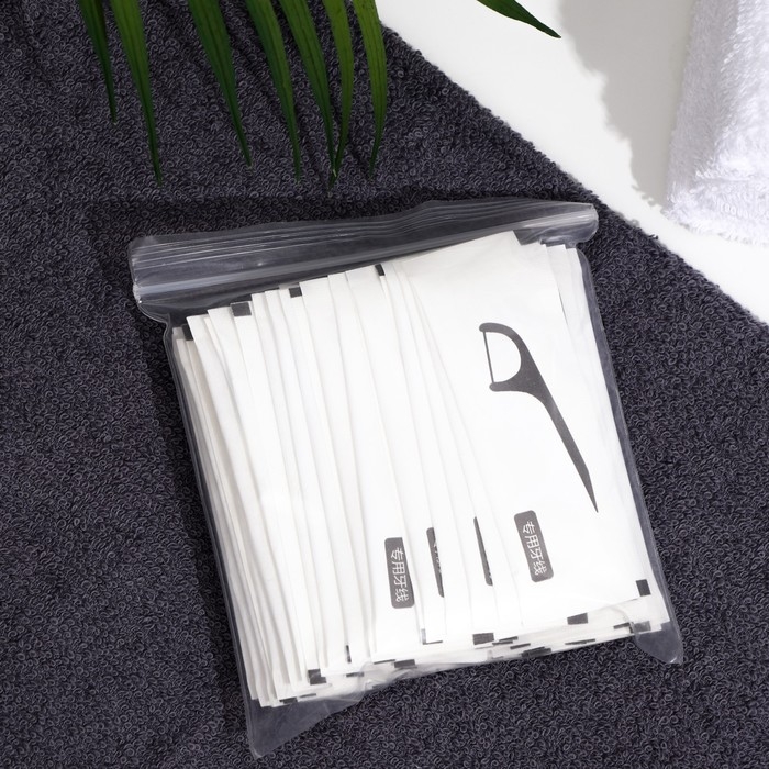 Зубная нить в пластиковом держателе, индивидуальная упаковка, набор 50 шт. Зубная нить в пластиковом держателе, индивидуальная упаковка, набор 50 шт.