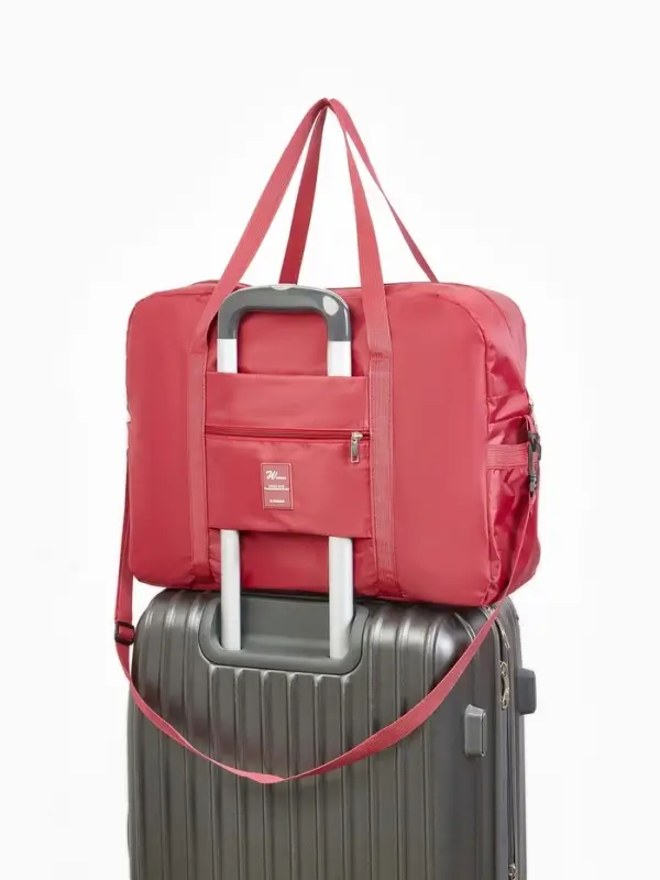 Сумка дорожная на молнии, 3 наружных кармана, держатель для чемодана, длинный ремень, бордовая