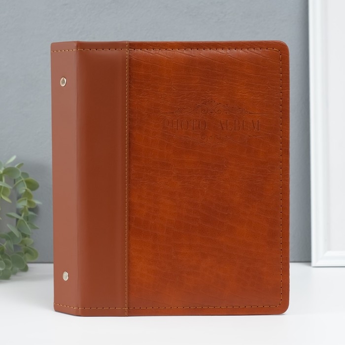 Фотоальбом на 200 фото 10х15 см Фотоальбом на 200 фото 10х15 см "Змея" коричневый кожзам 4х20,3х26,2 см