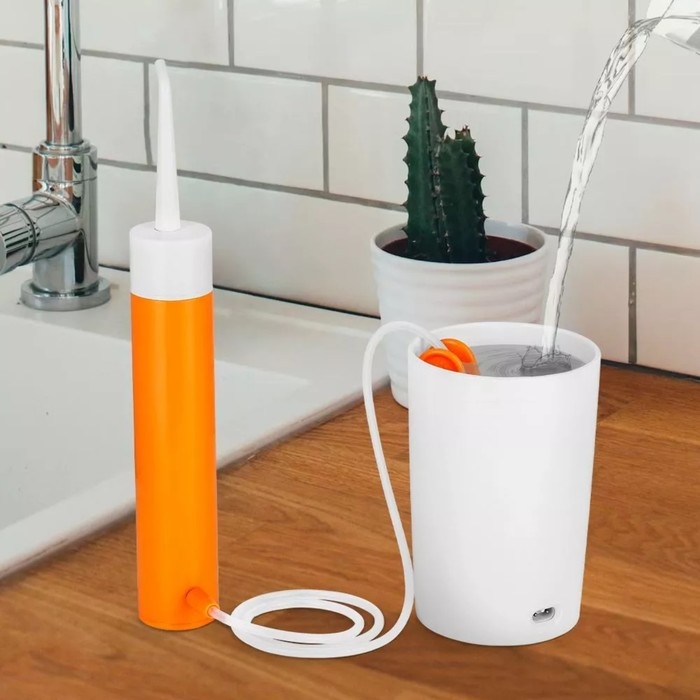 Ирригатор Kitfort КТ-2957-4, портативный, 320 мл, 3 режима, 2 насадки, от АКБ, бело/оранж. Ирригатор Kitfort КТ-2957-4, портативный, 320 мл, 3 режима, 2 насадки, от АКБ, бело/оранж.