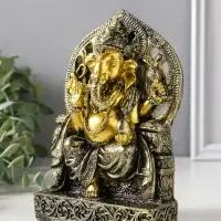 Сувенир полистоун "Ганеша на резном троне" золотая бронза 4х11,7х17,3 см