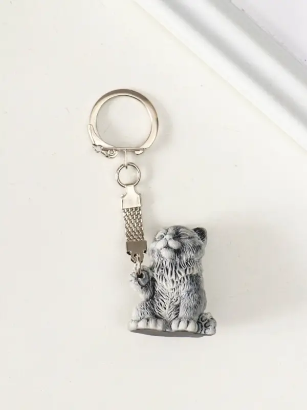 Брелок Брелок "Котенок с поднятой лапкой маленький" 3,5 см