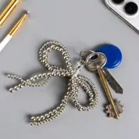 Брелок на карабине "Двойной бант" серебро, бусины d=0,4 и 0,5 см 11,5х9,5х1 см Брелок на карабине "Двойной бант" серебро, бусины d=0,4 и 0,5 см 11,5х9,5х1 см