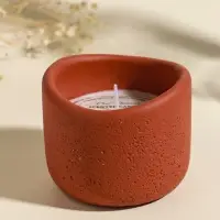 Свеча в вулканическом подсвечнике "Изгиб" персиковая 8,3х8,5х7 см