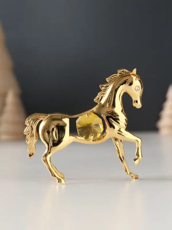 Сувенир Лошадка маленькая с 2-мя желтыми хрусталиками, 7х2х6 см. Сувенир Лошадка маленькая с 2-мя желтыми хрусталиками, 7х2х6 см.