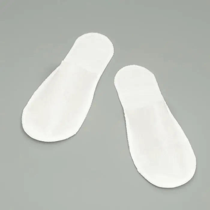 Тапочки одноразовые Эконом белые, закрытый мыс Тапочки одноразовые Эконом белые, закрытый мыс