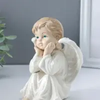 Сувенир керамика "Ангел в белом платье, сидит" 10х11х15,5 см