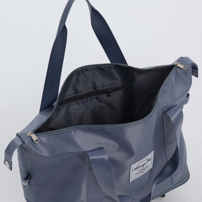 Сумка дорожная на колёсах, с увеличением, наружный карман, держатель для чемодана, цвет голубой Сумка дорожная на колёсах, с увеличением, наружный карман, держатель для чемодана, цвет голубой