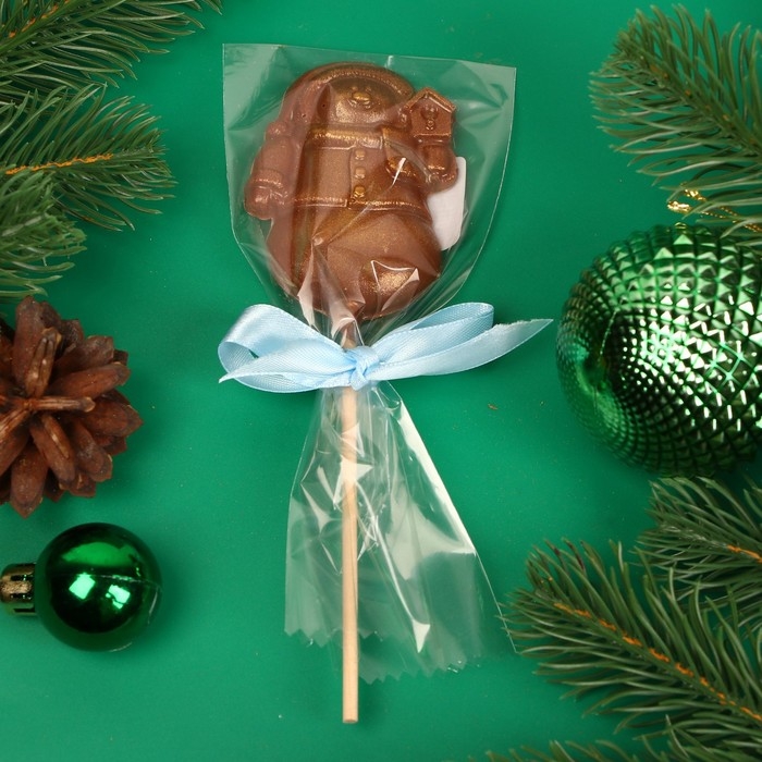 Новый год. Фигура из молочного шоколада Новый год. Фигура из молочного шоколада "Снежная баба", на палочке , 20 г ± 5 %