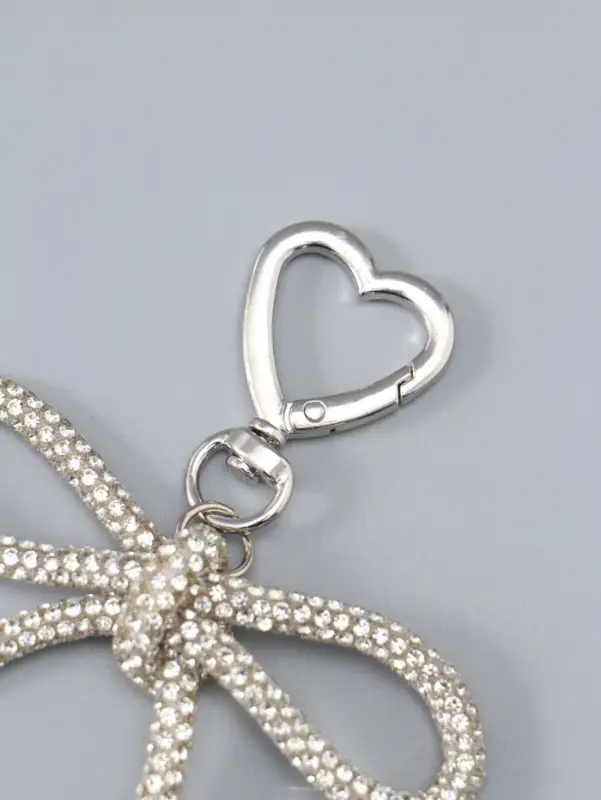 Брелок на карабине "Бант со стразами" серебро 11х7,5х1,5 см