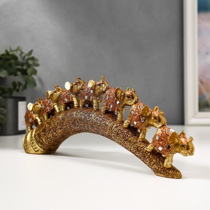 Сувенир полистоун Сувенир полистоун "Семь бронзовых слонов с попоной из арабского ковра на роге" 11,5х31х5 см