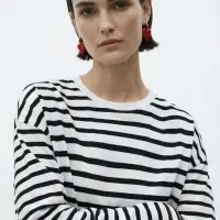 Серьги со съмными элементами "Сердца" вытянутые, цвет красный в золоте