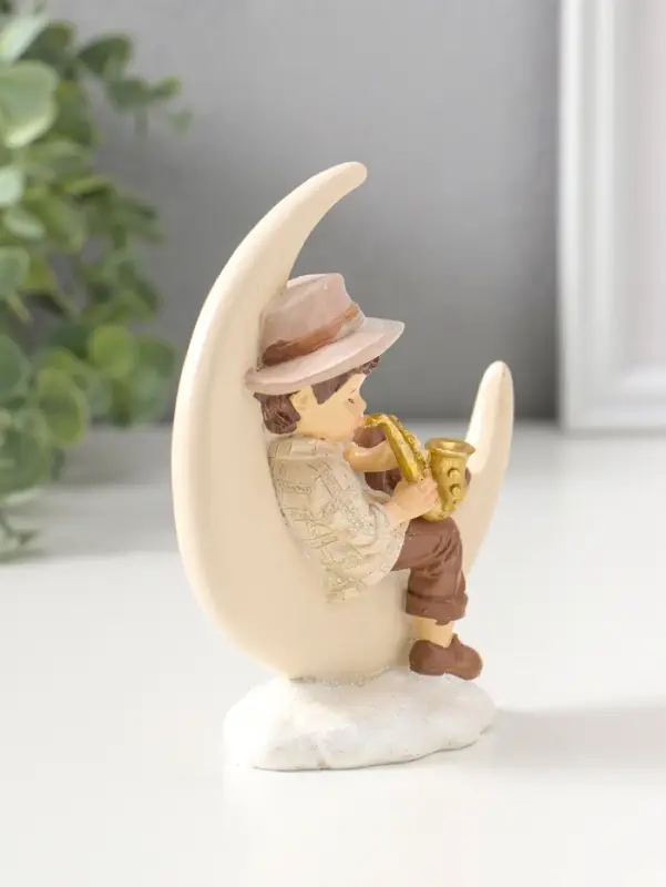 Сувенир полистоун "Мальчик на месяце играет на трубе" 13 см