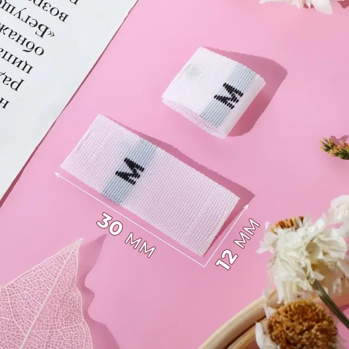 Размерники жаккардовые, «М», 12×30 мм, 100 шт., белые Размерники жаккардовые, «М», 12×30 мм, 100 шт., белые