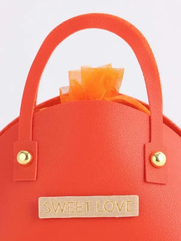 Кожанная подарочная сумочка 14 х 6,5 х 12,8 см оранжевая Кожанная подарочная сумочка 14 х 6,5 х 12,8 см оранжевая