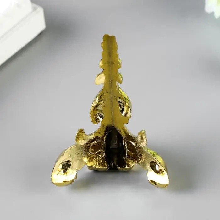 Уголок (ножка) для шкатулки "Фигурная" 6,2х4 см С-023