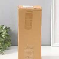 Сувенир полистоун "Девушка в бело-сером костюме с компьютером в наушниках" 24 см