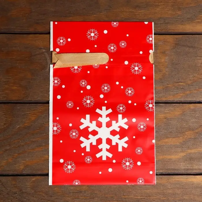 Пакет полиэтиленовый подарочный, с завязками  Пакет полиэтиленовый подарочный, с завязками "Снежинки", 15*23см.