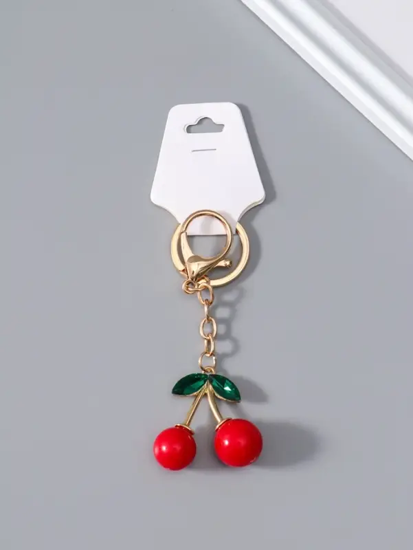 Брелок пластик с ремешком "Вишенки с листьями" 9х4х1,7 см