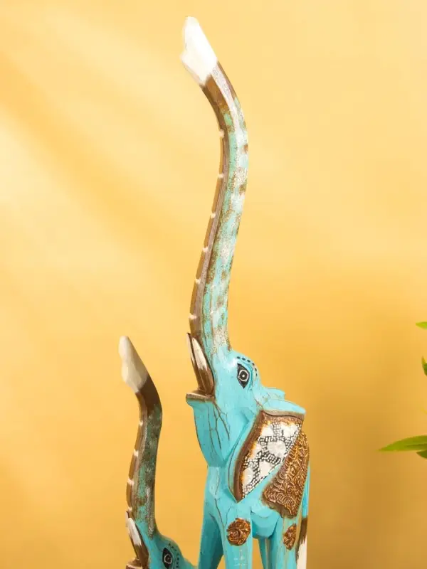 Сувенир Сувенир "Слоны" дерево 20х12х100 см, цв. бирюзовый