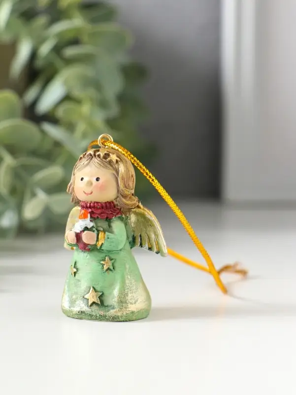 Сувенир полистоун "Ангелочек со звёздами на зелёном платье, со свечой в руках" 3,8х2,6х5 см   109157