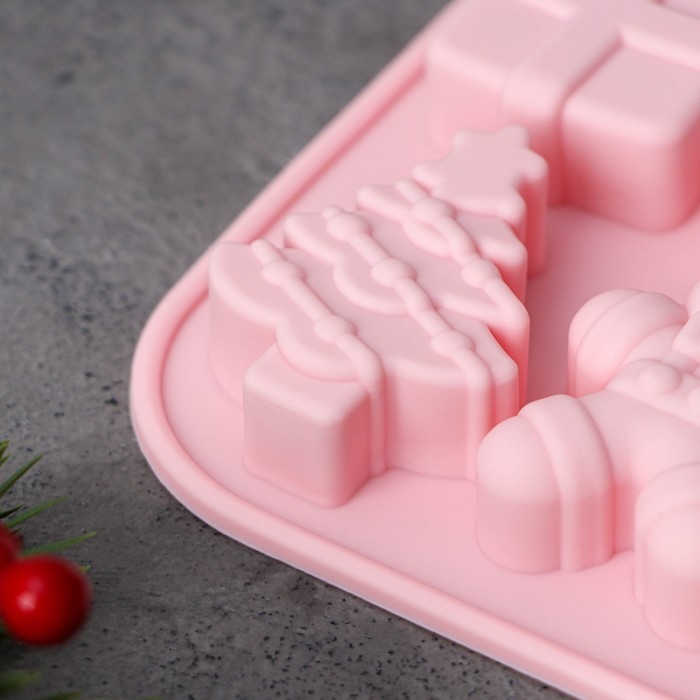 Форма для выпечки новогодняя Доляна «Новогодние подарки», силикон, 20×12,7×1,7 см, 14 ячеек, цвет розовый Форма для выпечки новогодняя Доляна «Новогодние подарки», силикон, 20×12,7×1,7 см, 14 ячеек, цвет розовый