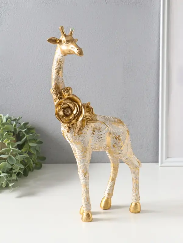 Сувенир полистоун "Жираф с листьями и цветами" бело-золотой 17,3х8,3х35,5 см