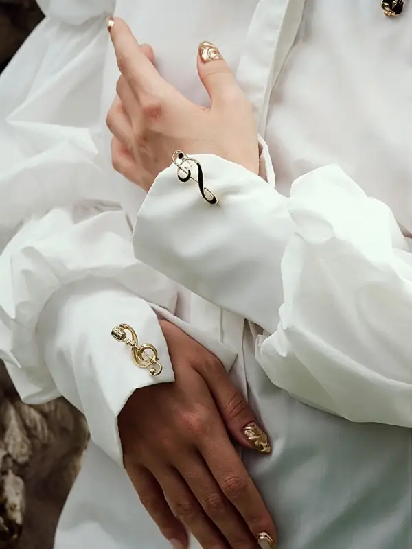 Брошь &laquo;Нота. Скрипичный ключ&raquo;, чёрная в золоте