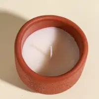 Свеча в вулканическом подсвечнике "Изгиб" персиковая 8,3х8,5х7 см