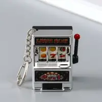 Брелок пластик "Игровой автомат - казино" серебро 2,7х3,4х5 см Брелок пластик "Игровой автомат - казино" серебро 2,7х3,4х5 см