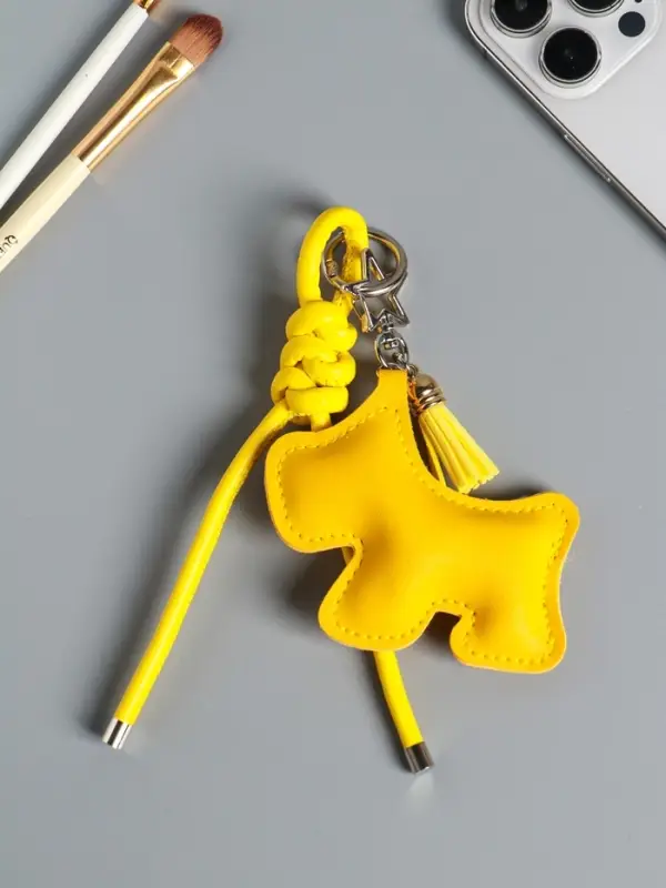 Брелок на карабине кожзам Брелок на карабине кожзам "Терьер" с узлом, жёлтый 14х8х1,2 см