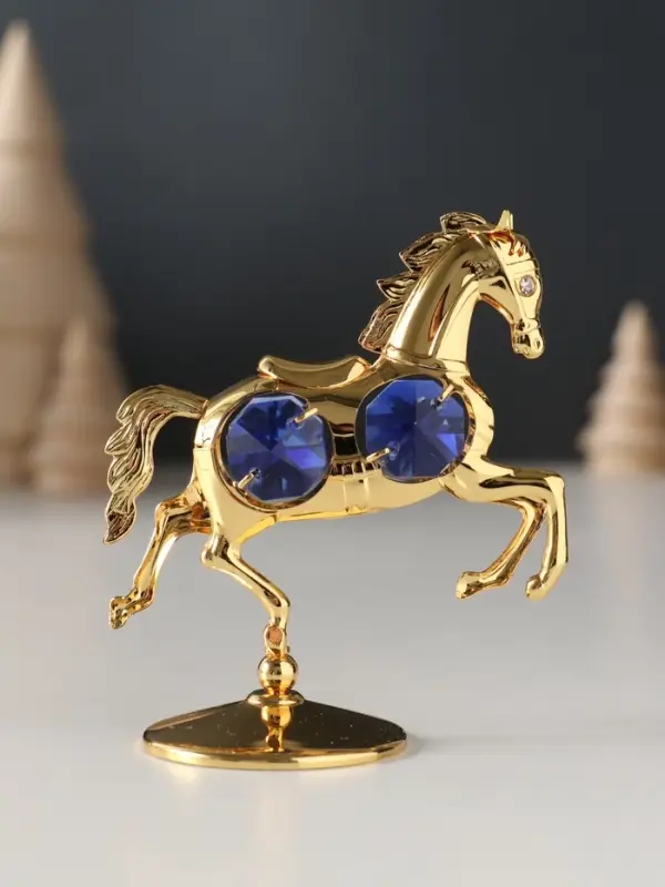 Сувенир Лошадка маленькая с 4-мя синими хрусталиками на подставке, 6,5х4х8,5 см. Сувенир Лошадка маленькая с 4-мя синими хрусталиками на подставке, 6,5х4х8,5 см.
