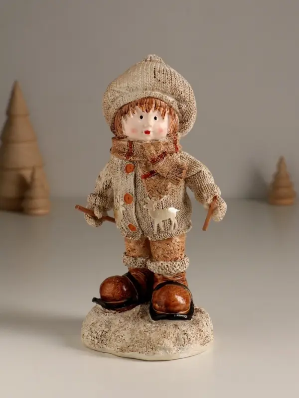 Сувенир полистоун  Сувенир полистоун "Малыш в вязаном наряде на мини-лыжах" 8,5х8х17,5 см